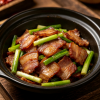Sautéed Chinese Cured Pork Belly & Fresh Garlic Scapes